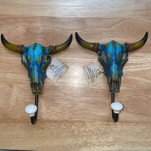 NWT animal skull with horns and hook. Hangers selling both for one price.